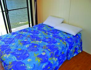 A pair of rooms set up with double beds are standard on the new houseboat.